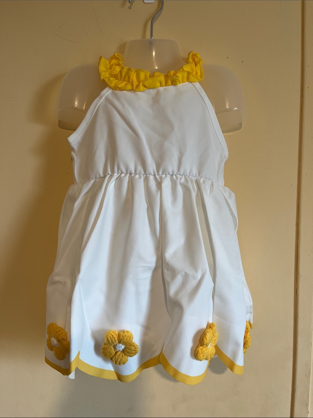 White Baby Dress with Yellow Trim and Flower Appliqués